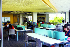 Photo of students studying in the renovated library at Wolfson.