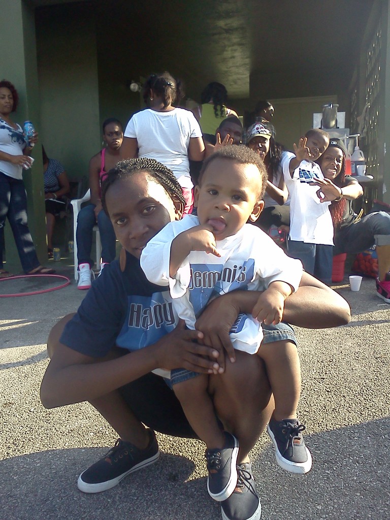 Jasmin Burger holding her son Jermoni.