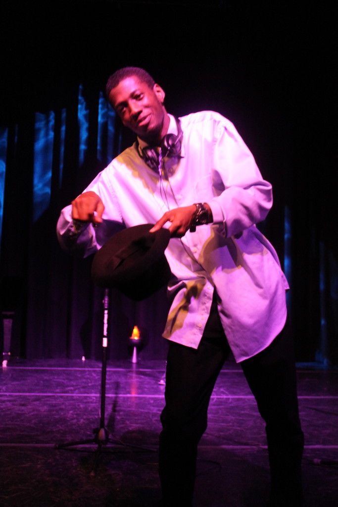 A young magician during his act.