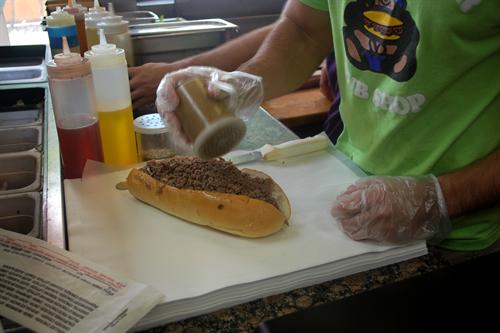 A sandwich being prepared at Hungry Bear.