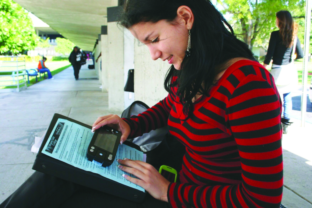 Tania Perez using her GW Micro Senseview Duo to read.