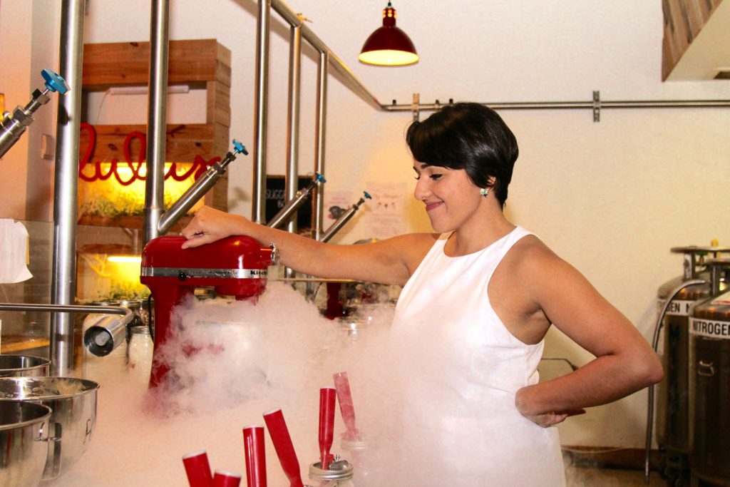 Luisa Santos at her ice cream shop making nitrogen ice cream.