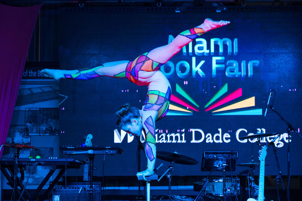 An acrobatics performer at the Miami Book Fair.