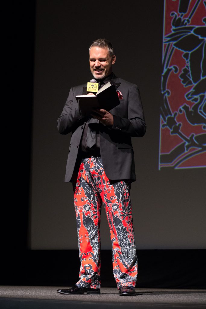 Director of Programming, Jaie Laplante talking on stage. Miami Film Festival
