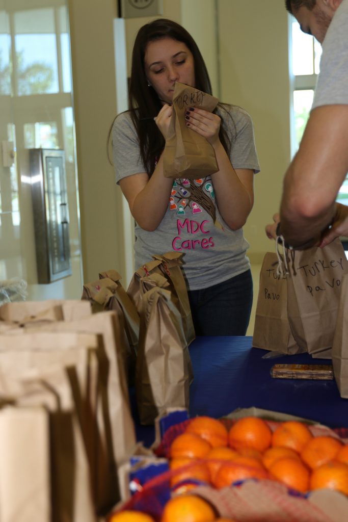 A student preparing a package.