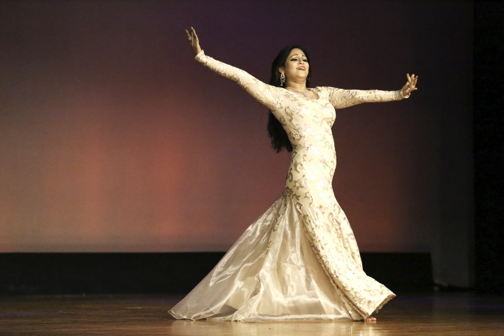 Dancer performing a traditional belly dance.