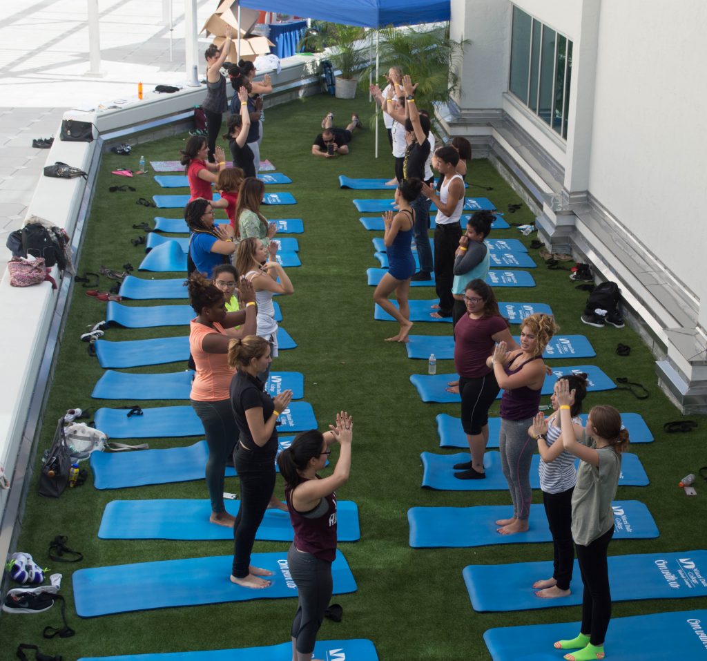 Students doing yoga.