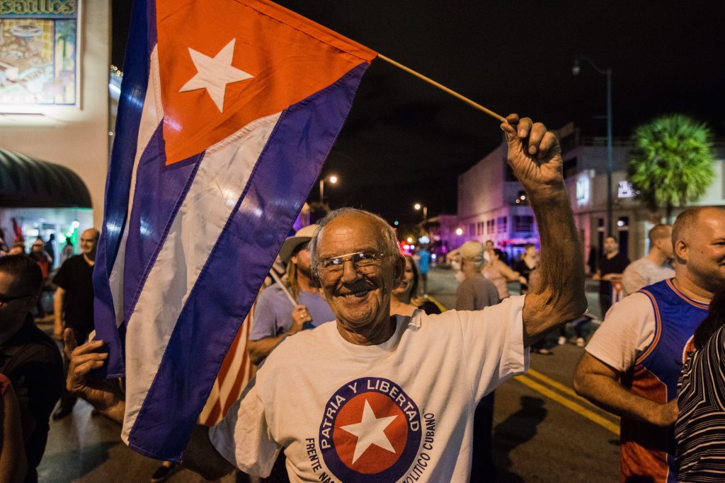 Franco Rogelio waving the Cuban flag in celebration of Fidel Castro's death.