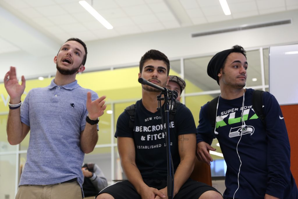 Students performing karaoke at Hialeah Campus.
