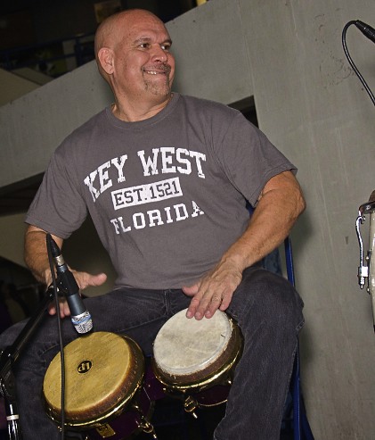Musician playing the congas.