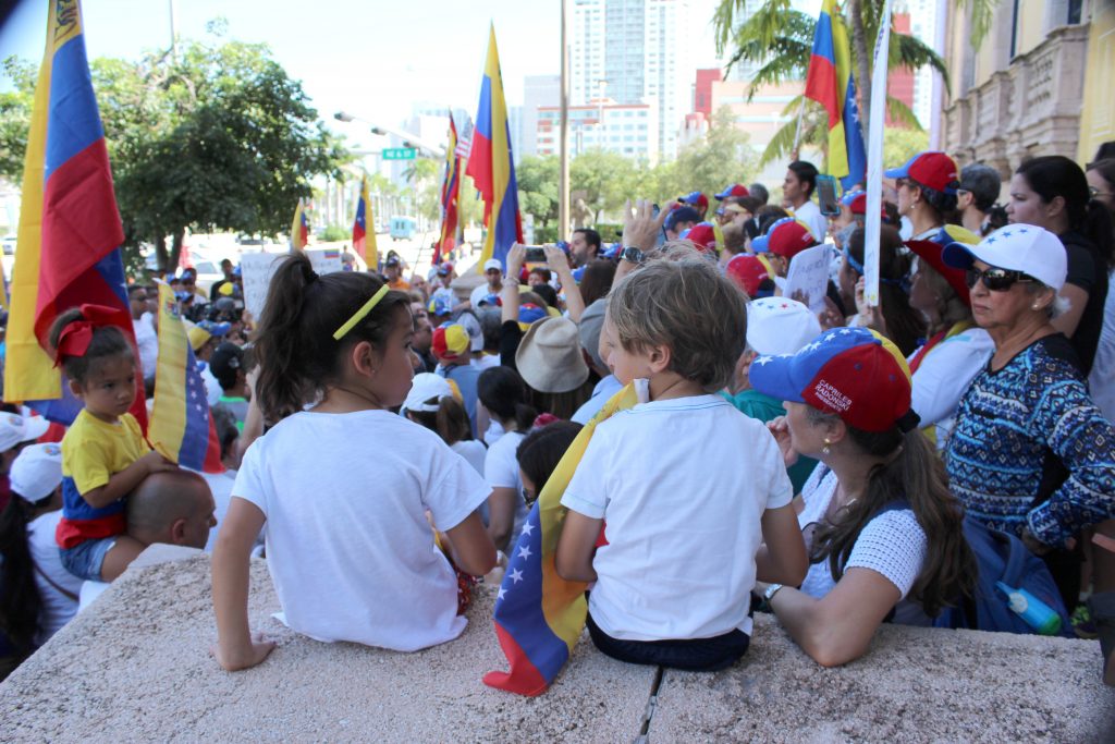Venezuelans protesting in front of the Freedom Tower.