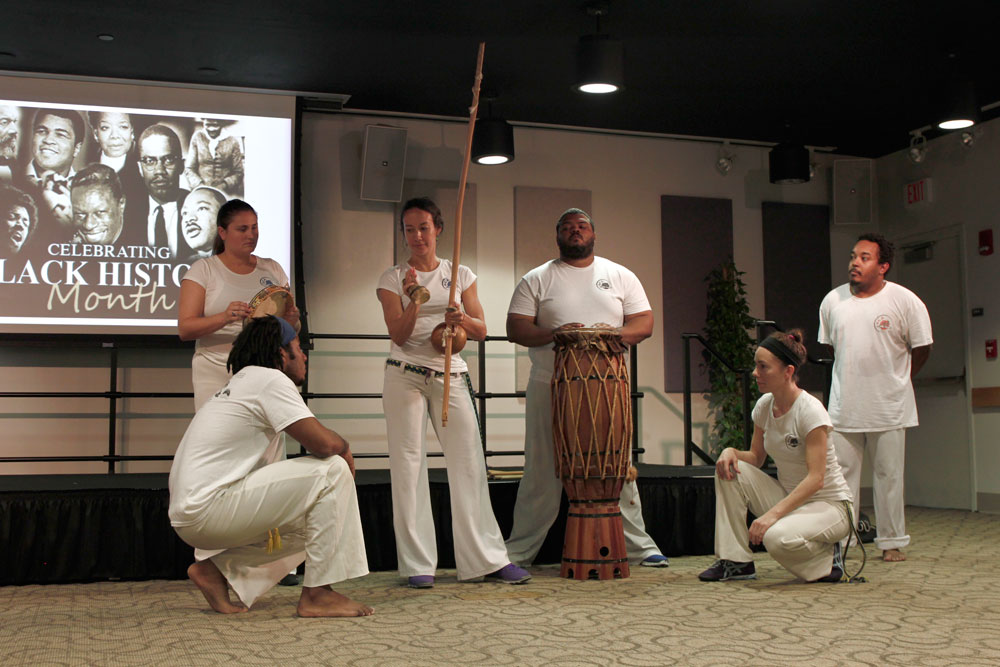 Capoeira performers at InterAmerican Campus.