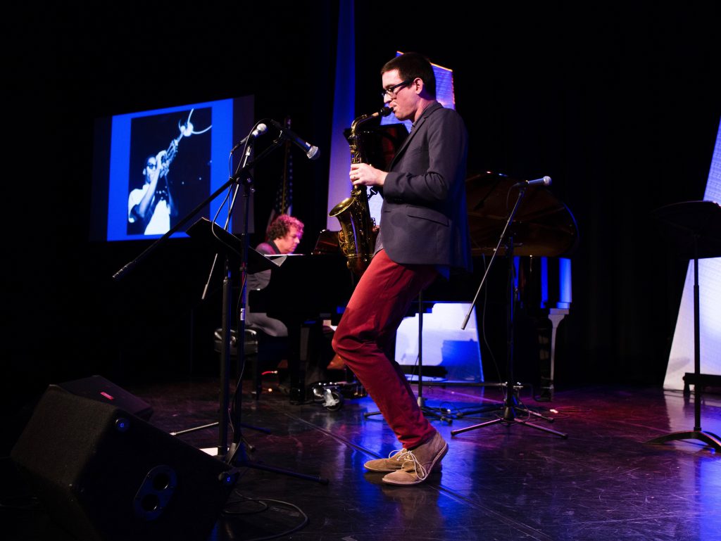 Musician Michael Thomas playing one of his songs.