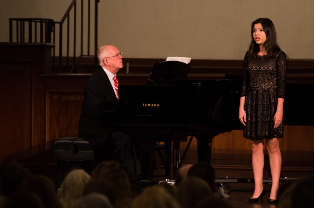 Angela Rodriguez singing.