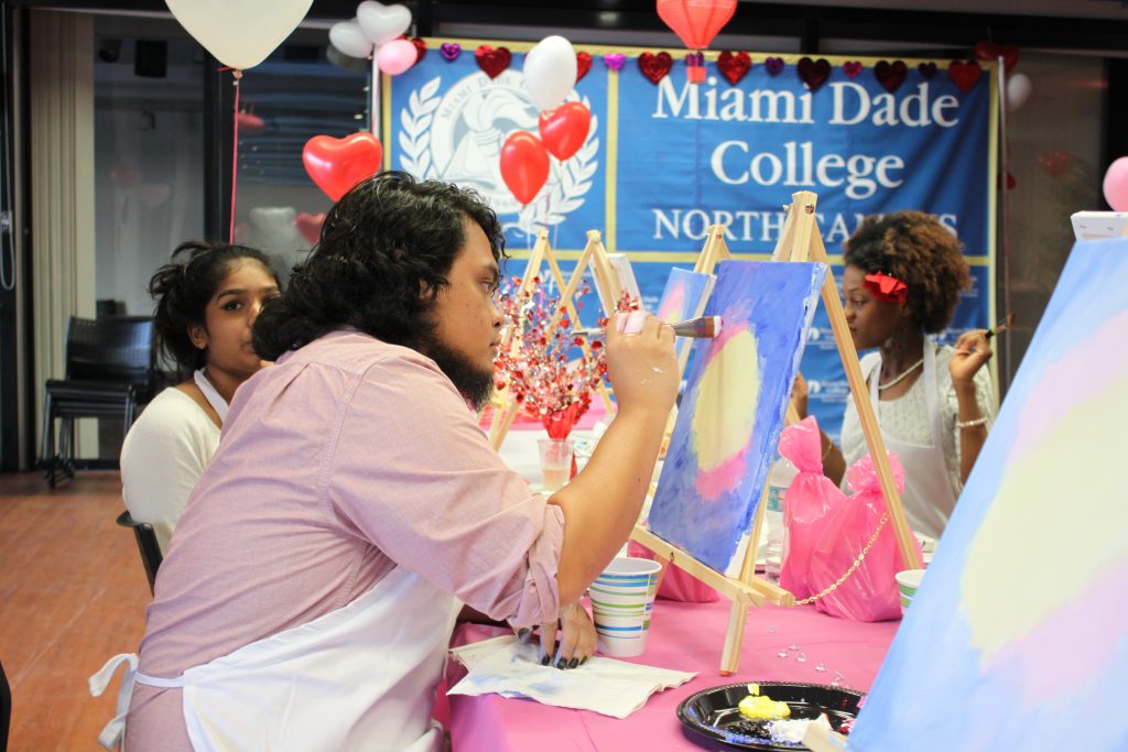 Richard Pascual painting during the Painting With MDC event.