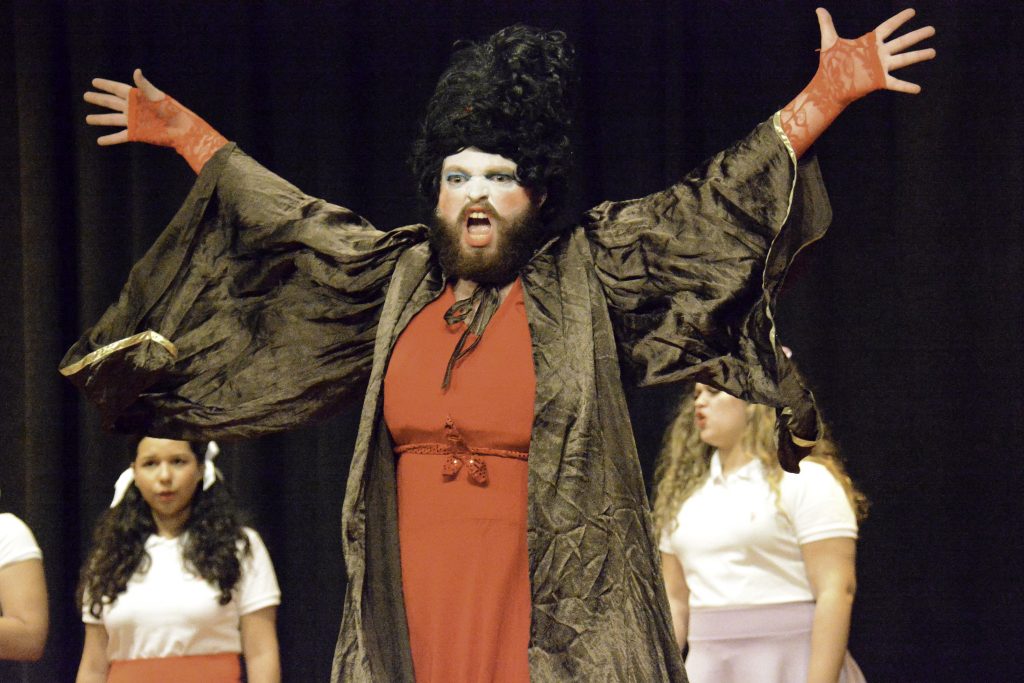 Student performing in the opera-theater play "The Mikado."