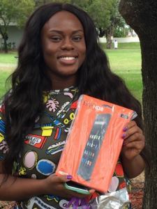 MDC student Ellen Charles with her kindle. Food Pantry