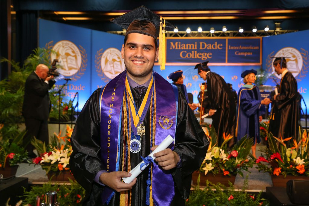 Photo of student Reynier Montalvan at graduation.