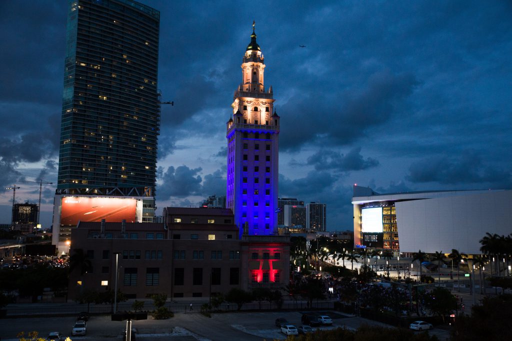 Photo of the Freedom Tower in colors of the Venezuelan flag.