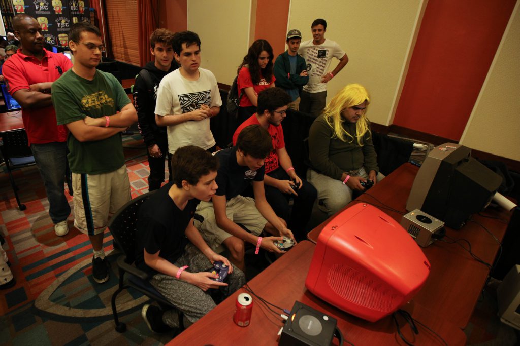 Gamers playing retro video games.
