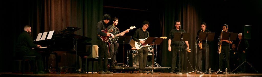 Jazz band performing on stage.
