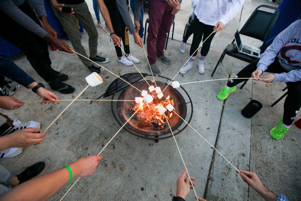 Students making s'mores.