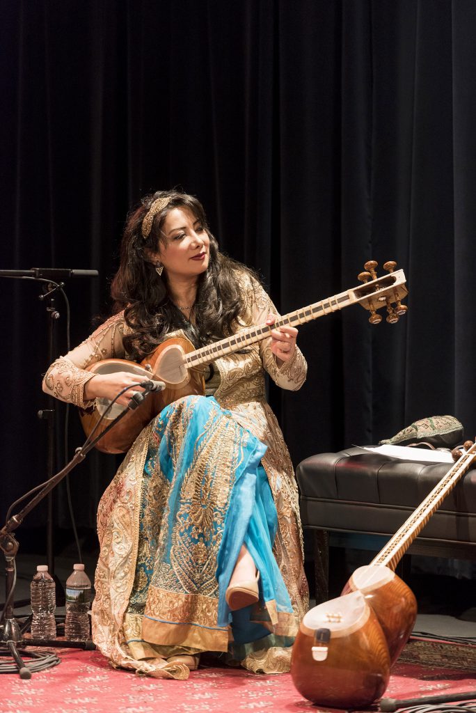 Sahba Motallebi performing on stage.