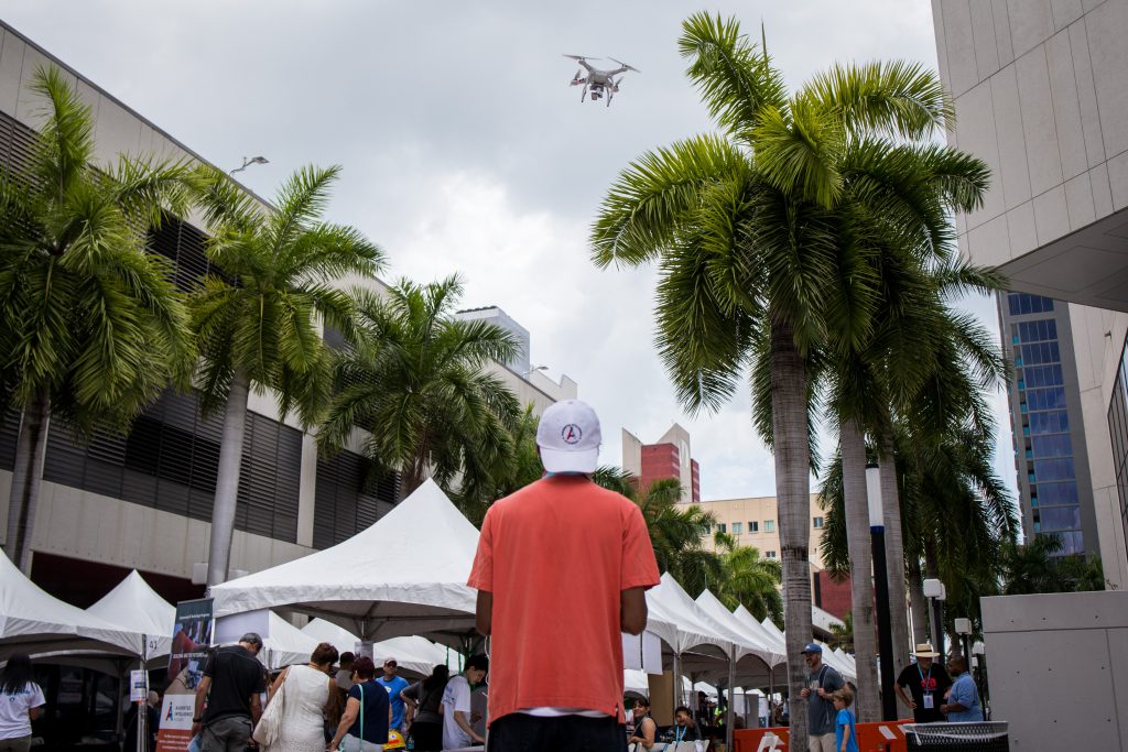 Dwayne Nicholson flying a drone.