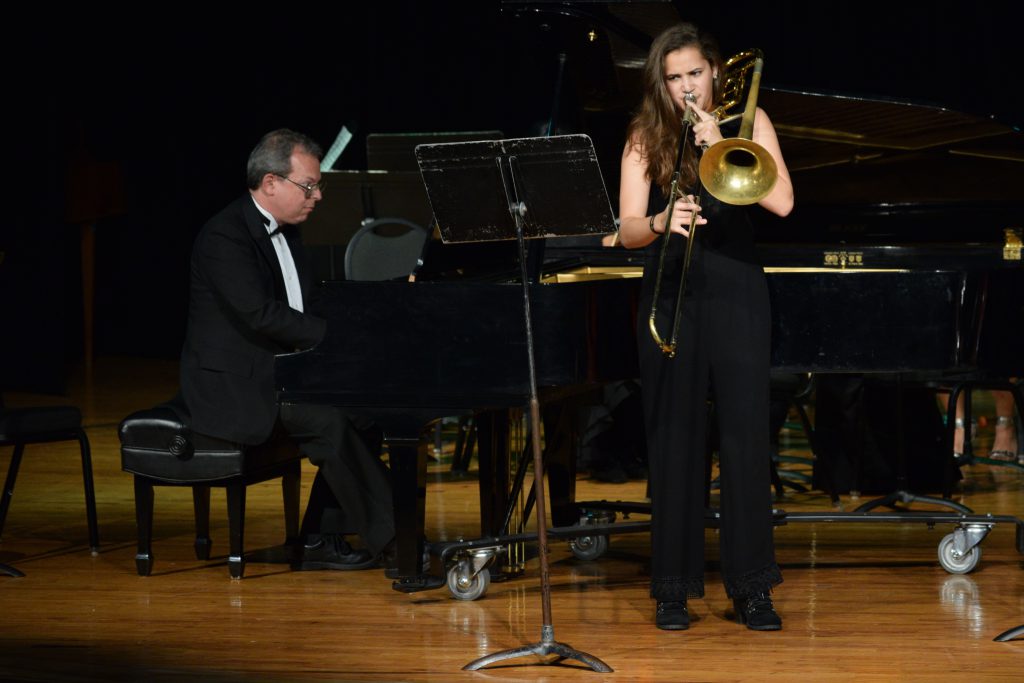 Karla Gonzalez performing on stage.