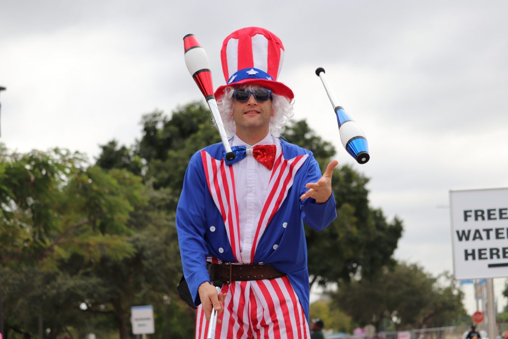 A juggler dressed as Uncle Sam.
