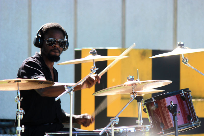 Student playing the drums.