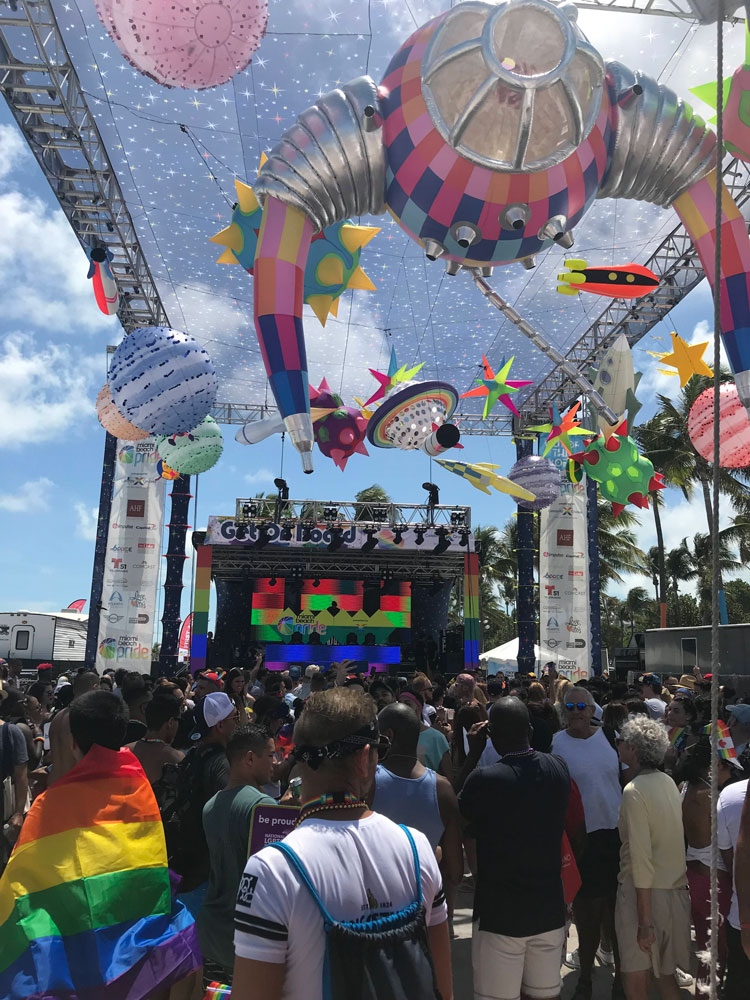A crowd in front of a stage.