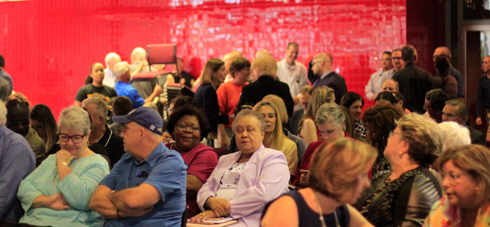 The audience made up of students, faculty and administrators.