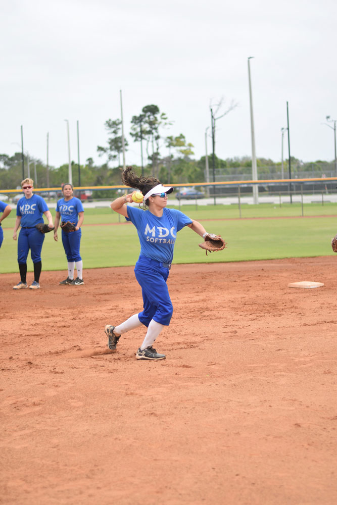 The Lady Sharks softball team at practice.