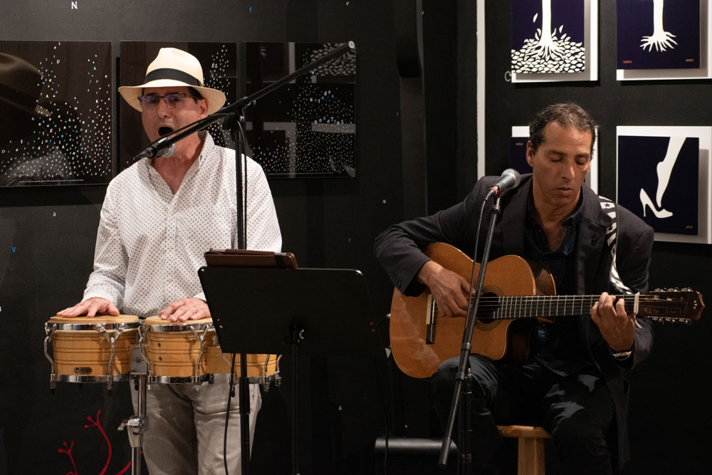 Musicians performing a poem by Jose Marti.