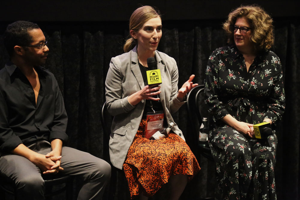 Three panelists discussing virtual reality.