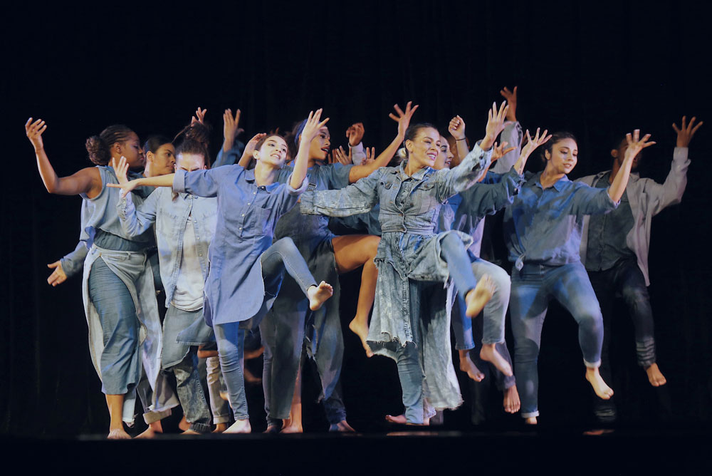 Students dancing on stage.